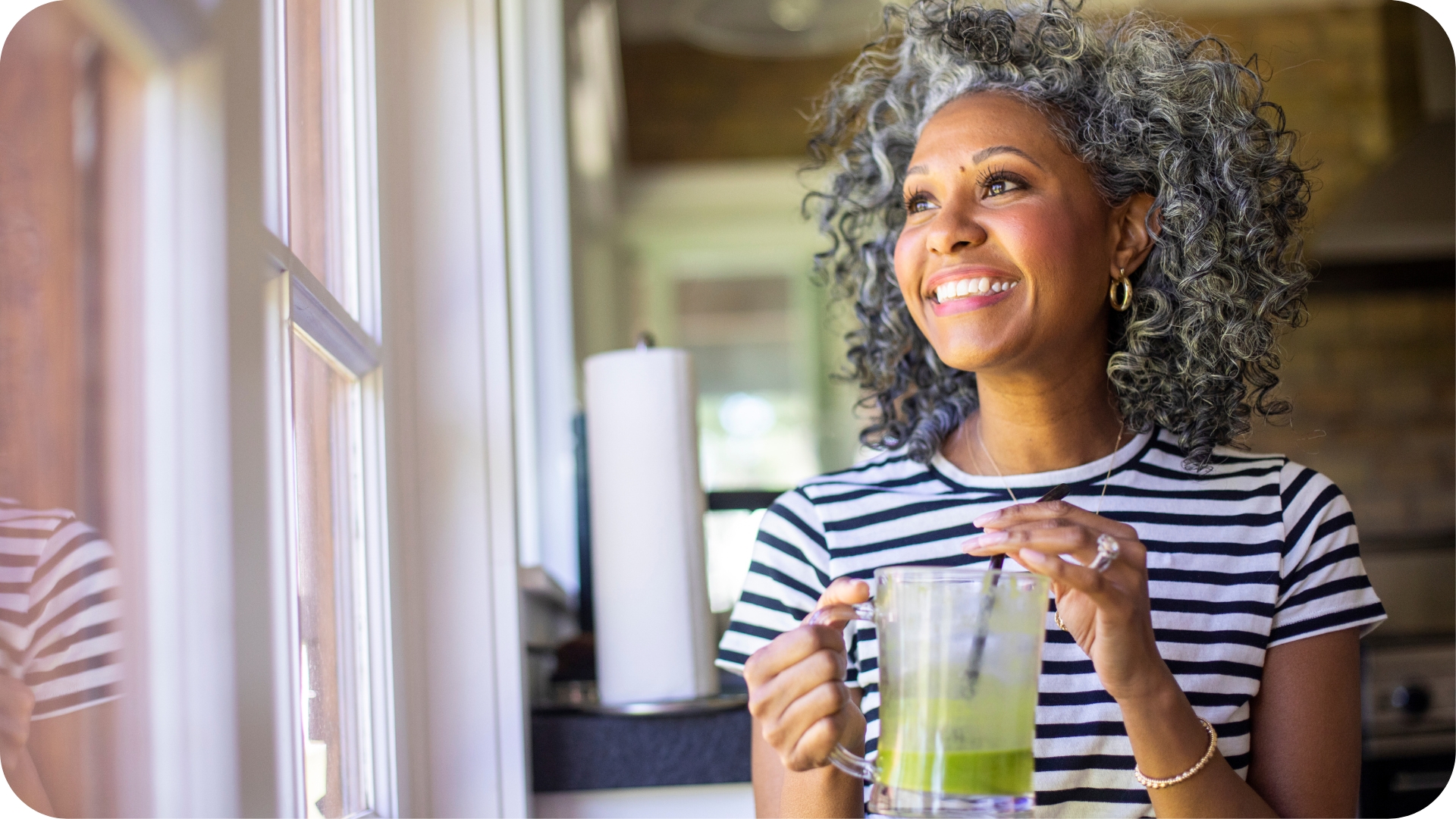 Midle-aged menopaused women drinking healthy smoothie