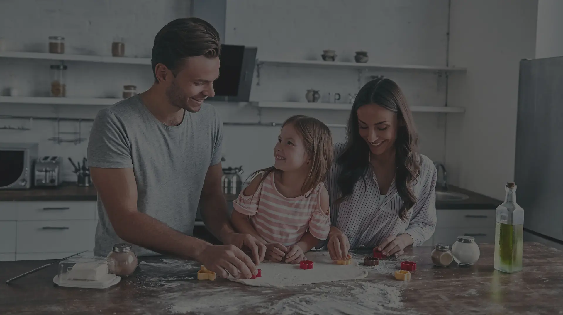 Family cooking in kitchen