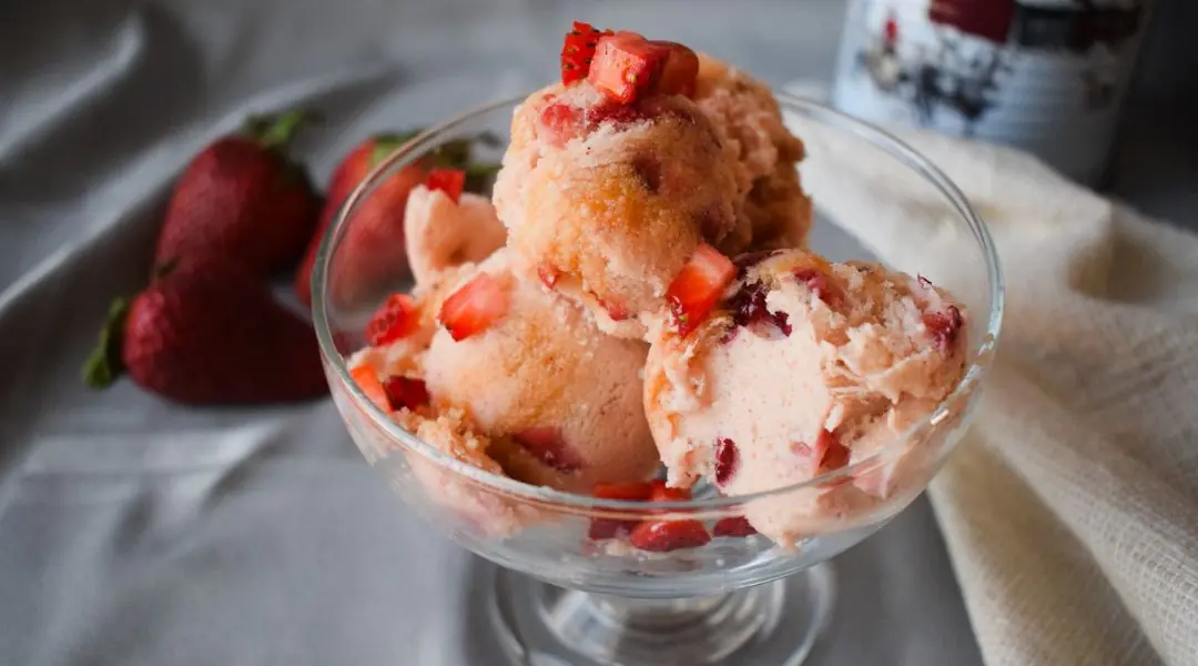 Homemade strawberry ice cream served in a bowl