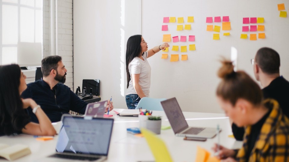 woman leading a team meeting