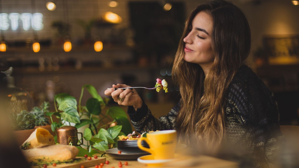 Girl eating conscious and intuitive eating