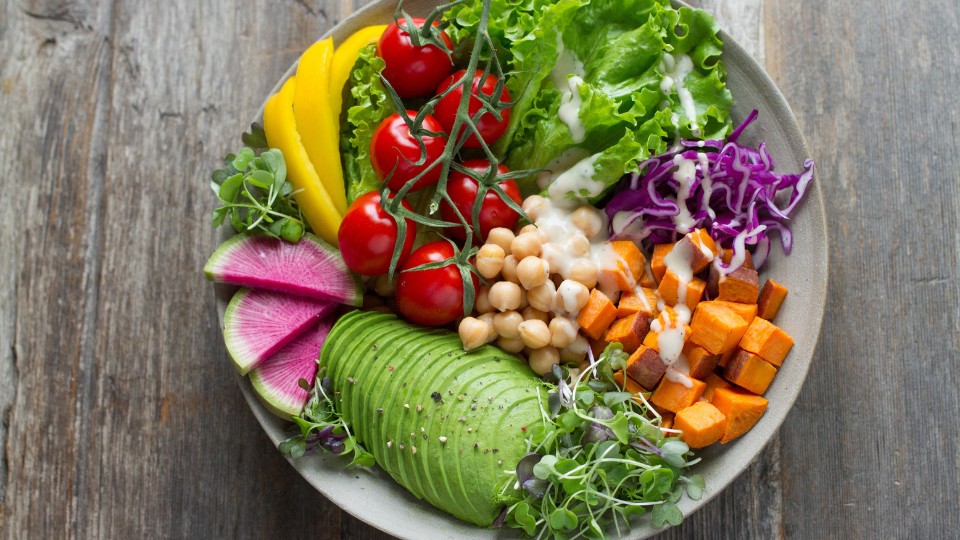 bowl of vegetables, avocado, chickpeas and tofu