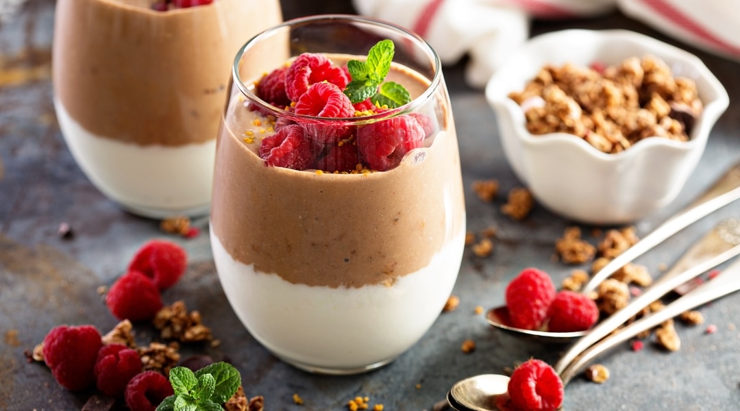 5 Ways to Reduce Your Carb Intake chocolate mousse in a glass with raspberries and granola