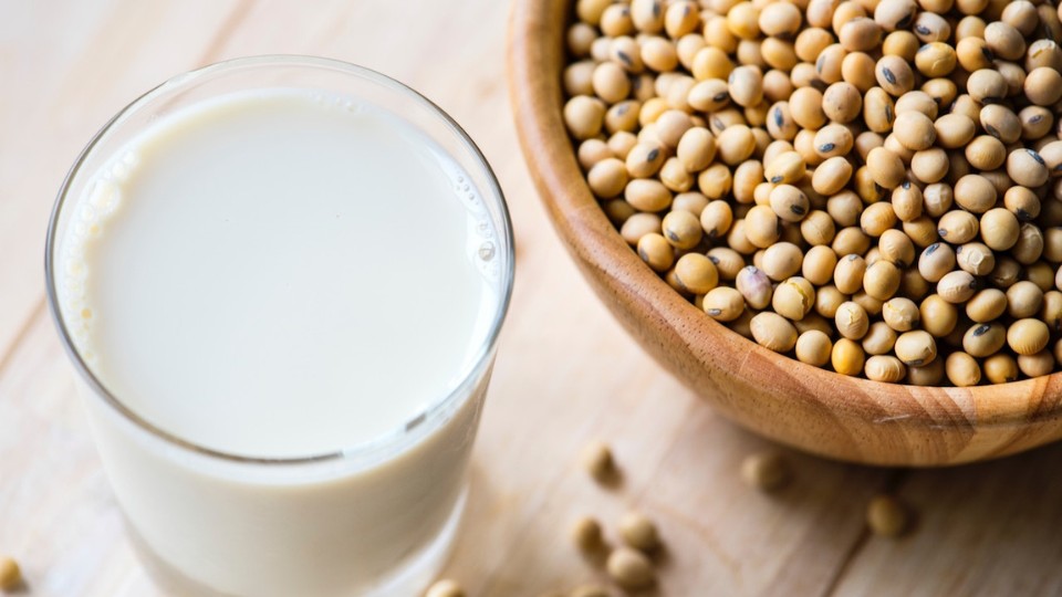 Glass of soy beans with soy beans