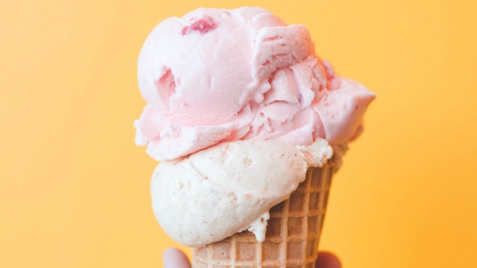 white and pink ice cream cone 