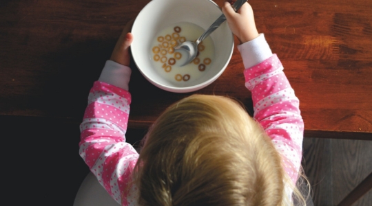 Kid eating cereals