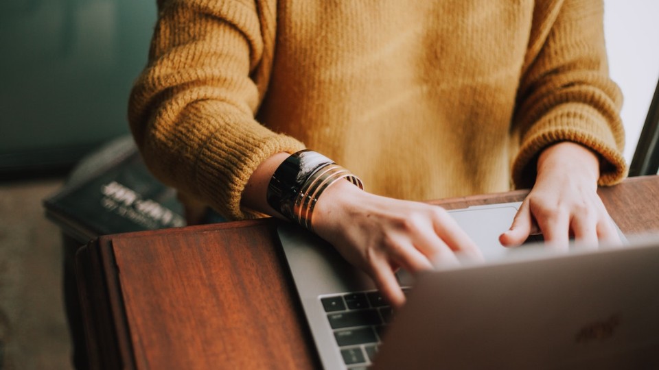 A dietitian working on her laptop 