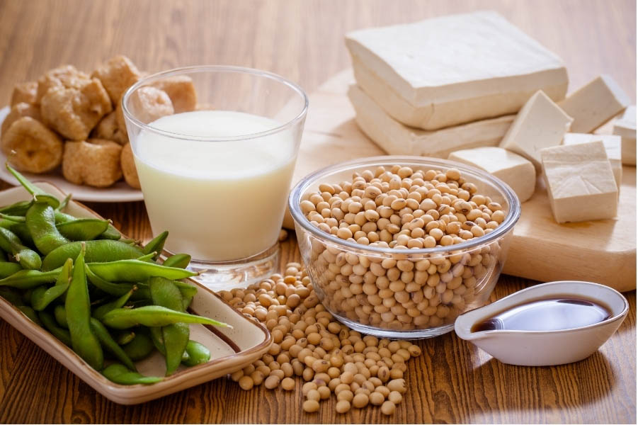 Various soy-based products including soybeans, soy milk, and tofu
