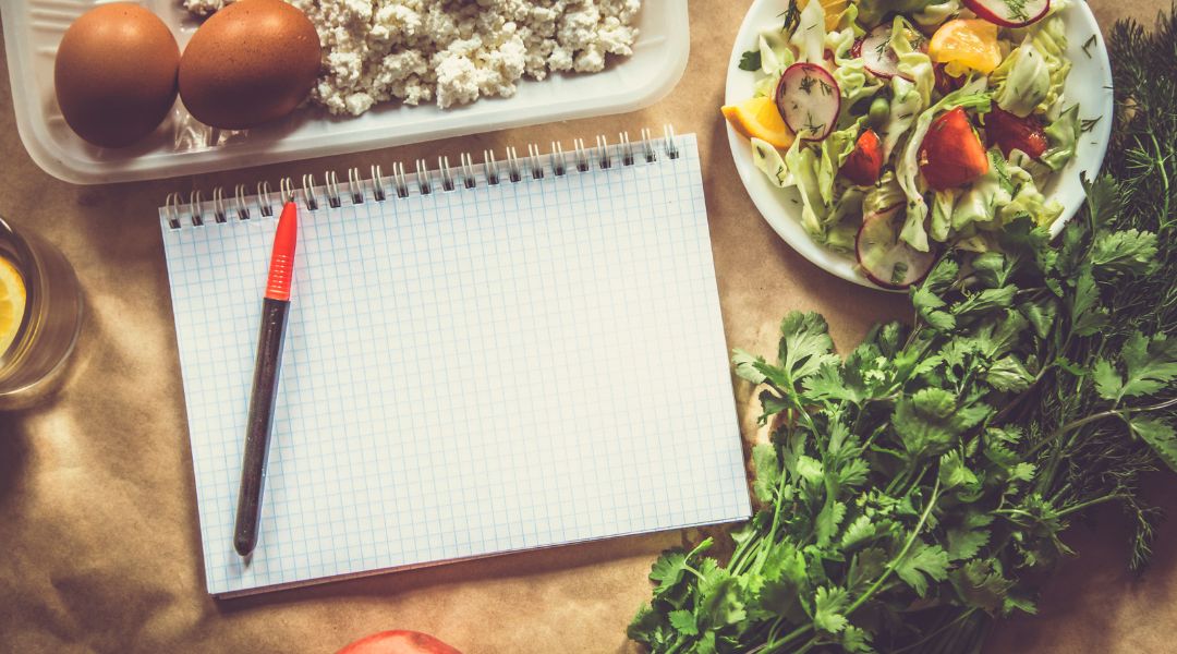 notebook with vegetables