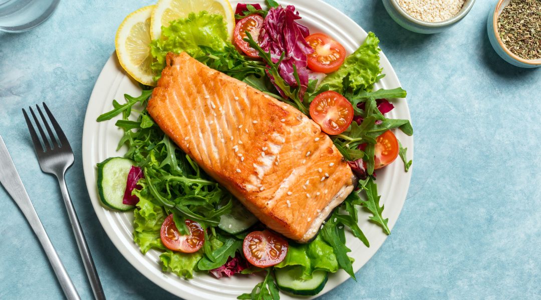 a plate with a salmon salad
