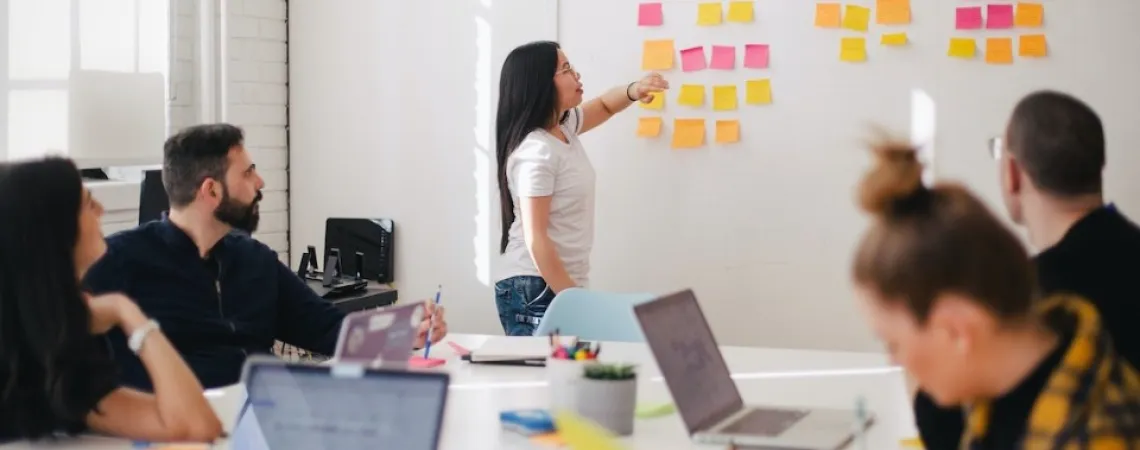 woman leading a team meeting