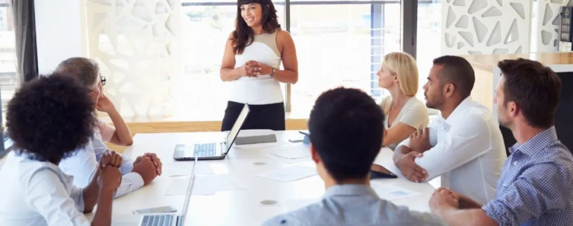 team meeting led by a woman