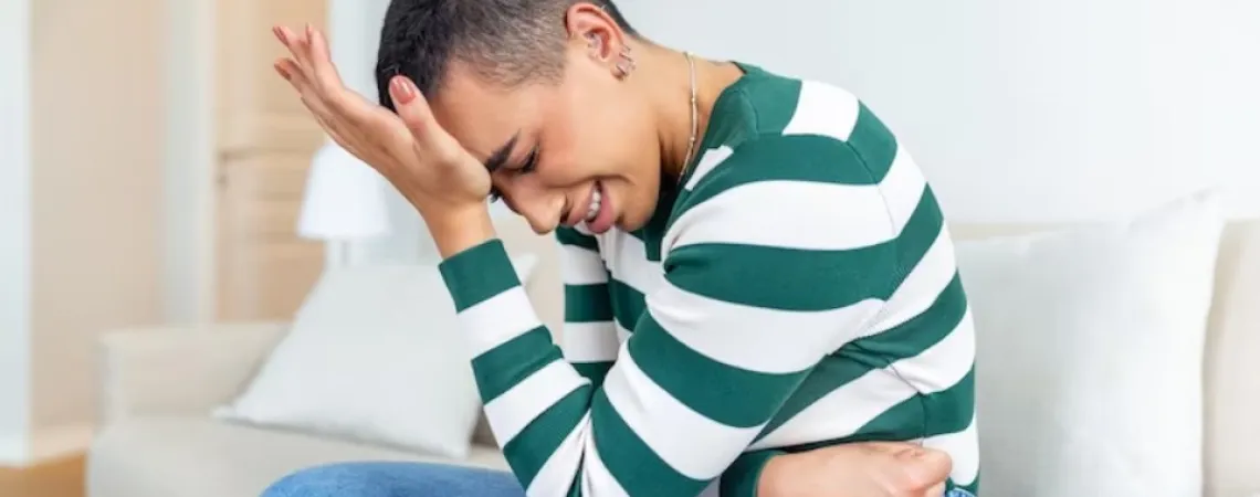 woman writhing in pain