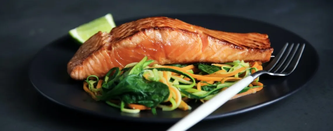 salmon with vegetables in a plate