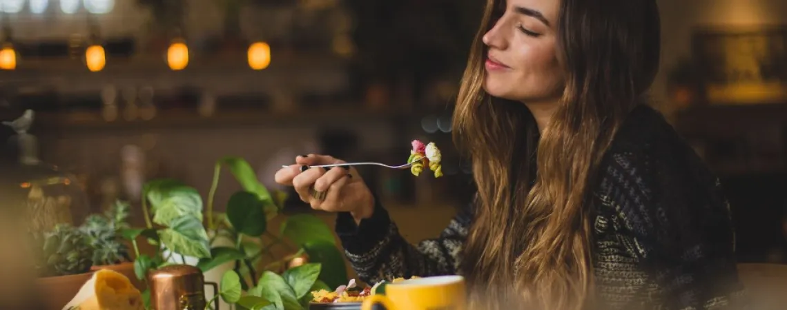 Girl eating conscious and intuitive eating