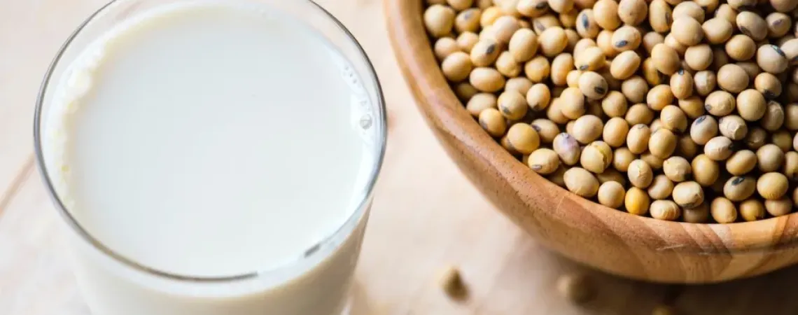 Glass of soy beans with soy beans