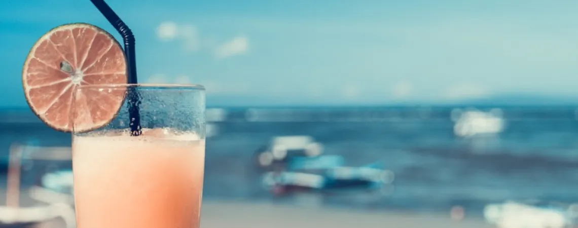 a cocktail on the beach