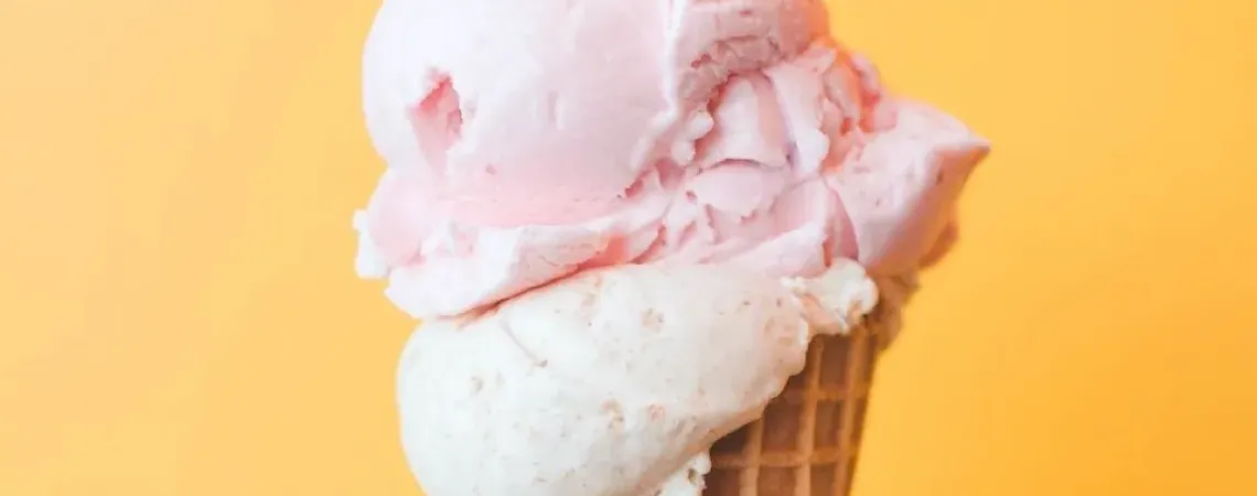white and pink ice cream cone