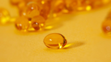 Vitamin on yellow background