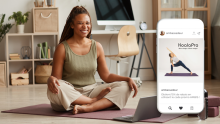 woman doing yoga enjoying the koalapro app