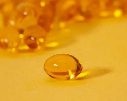 Vitamin on yellow background