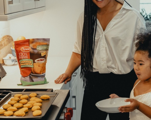 mother and daughter cooking