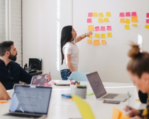 woman leading a team meeting