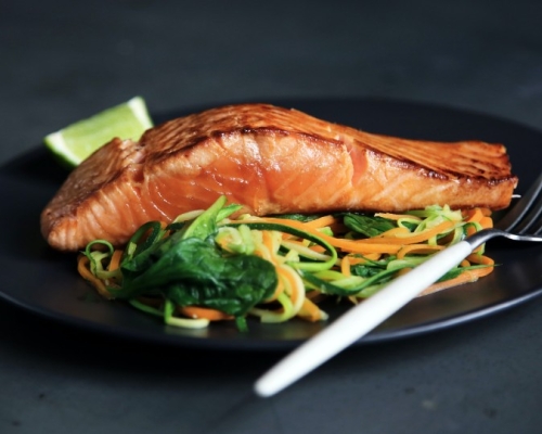 salmon with vegetables in a plate