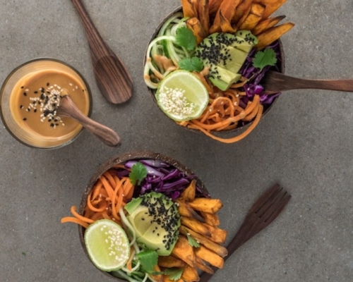 vegetable bowl with avocado and peanut sauce