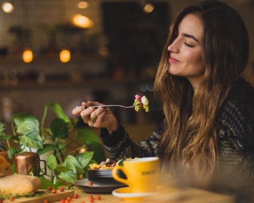 Girl eating conscious and intuitive eating