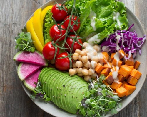 bowl of vegetables, avocado, chickpeas and tofu