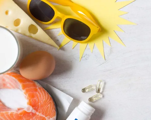 Ingredients arranged on a light surface: salmon, eggs, cheese, a glass of milk, a small bottle, and a comic-style yellow burst with sunglasses.