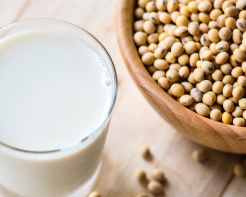 Glass of soy beans with soy beans