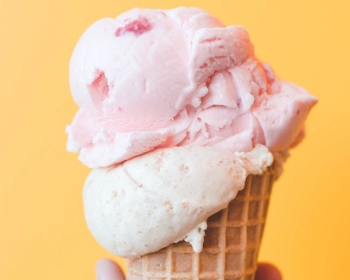 white and pink ice cream cone 