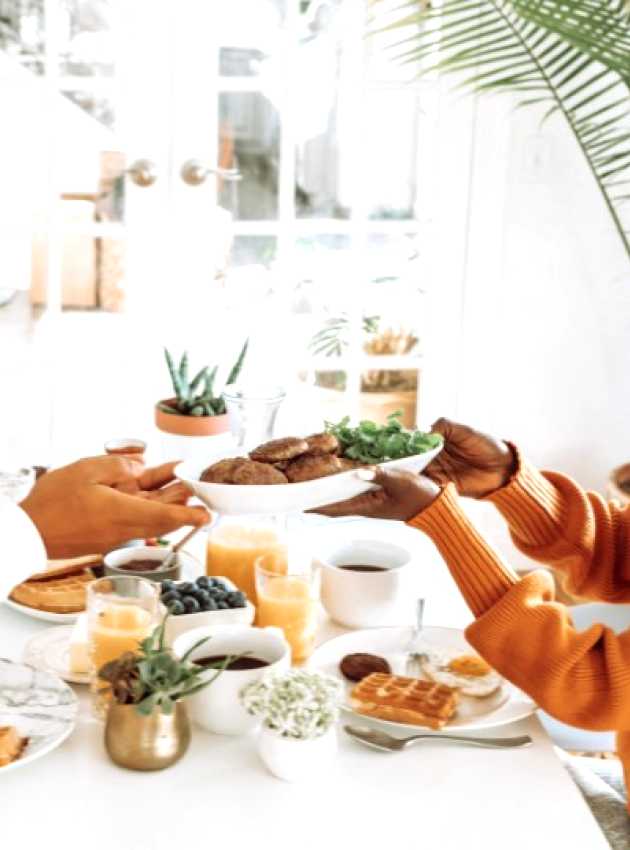 Couple with child sharing breakfast