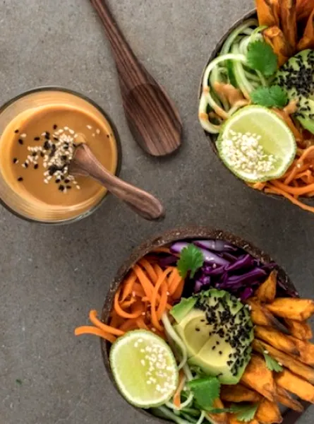 vegetable bowl with avocado and peanut sauce