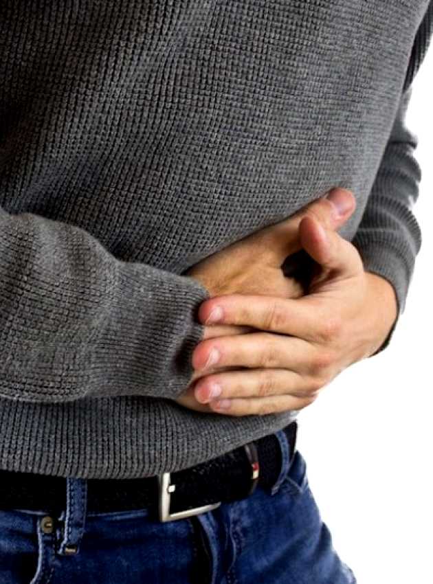 Man with a grey shirt having bloating