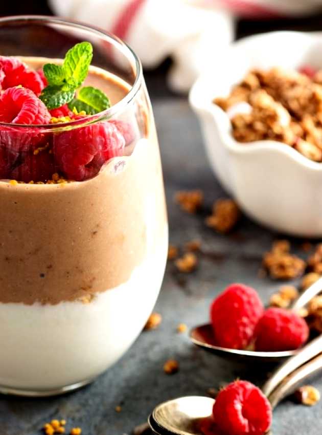 5 Ways to Reduce Your Carb Intake chocolate mousse in a glass with raspberries and granola