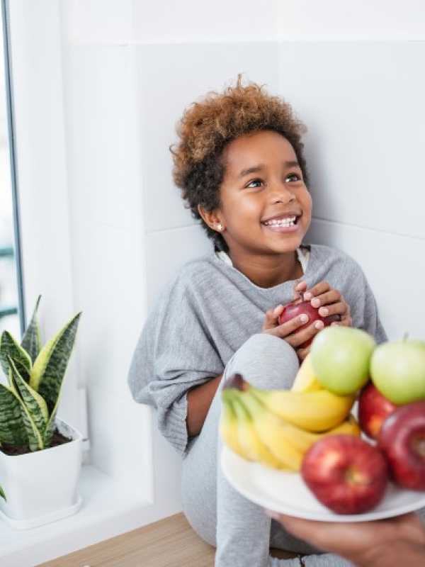 Child receiving a healthy snack